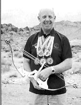 The author with a Groves/Merlin Flight bow in Nevada, 1997